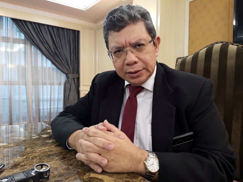 &copy; Reuters. FILE PHOTO: Malaysian Foreign Minister Saifuddin Abdullah speaks during an interview with Reuters in Kuala Lumpur