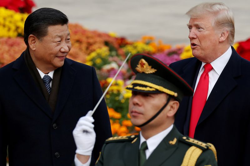 &copy; Reuters. FILE PHOTO: U.S. President Donald Trump takes part in a welcoming ceremony with China&apos;s President Xi Jinping at the Great Hall of the People in Beijing