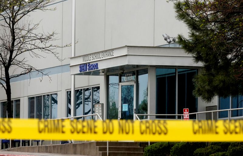 &copy; Reuters. FILE PHOTO: Crime scene tape is seen outside the school following the shooting at the Science, Technology, Engineering and Math (STEM) School in Highlands Ranch