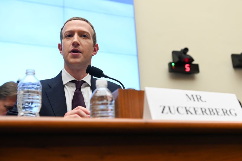 &copy; Reuters. Facebook Chairman and CEO Zuckerberg testifies at a House Financial Services Committee hearing in Washington