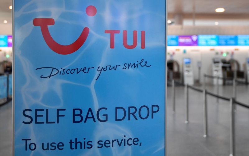 &copy; Reuters. TUI sign is seen at the check-in area at Gatwick Airport, in Gatwick