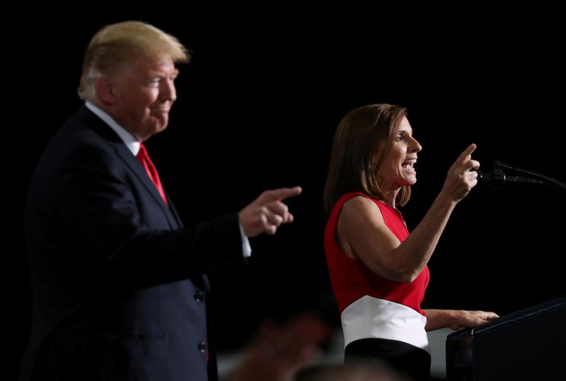 &copy; Reuters. FILE PHOTO: U.S. President Donald Trump and Senate candidate Martha McSally rally with supporters at Phoenix-Mesa Gateway Airport in Mesa, Arizona