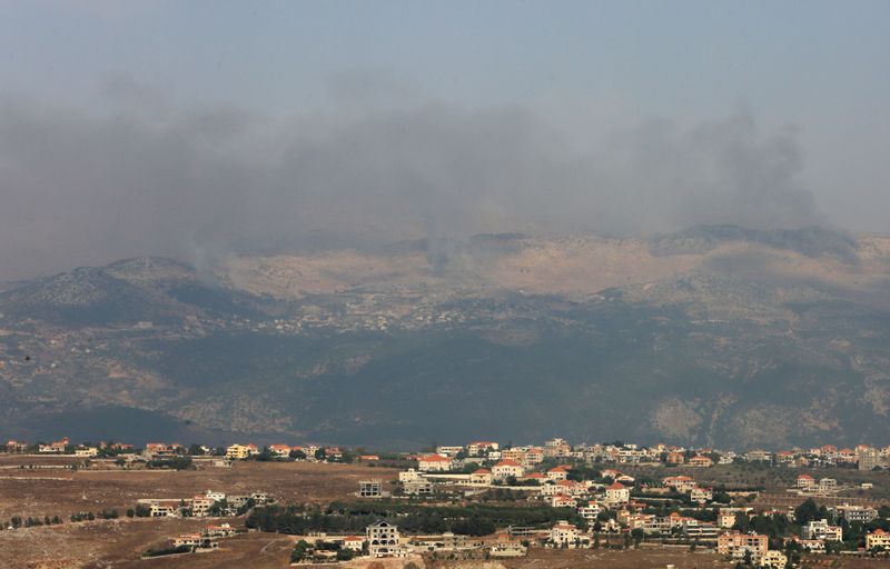 &copy; Reuters. Smoke rises from the disputed Shebaa Farms area as seen from Marjayoun village