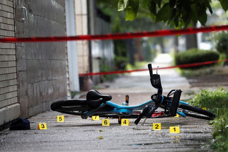 &copy; Reuters. Chicago Police shell casing markers are seen, where a 37-year-old man riding a bicycle was shot and pronounced dead at the hospital according to local media reports, at the West Side of Chicago