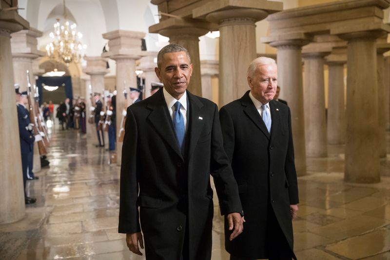 &copy; Reuters. FILE PHOTO: President Barack Obama and Vice President Joe Biden walk through the Crypt of the Capitol in Washington