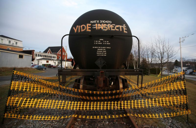 &copy; Reuters. FILE PHOTO: A tanker with an inscription which reads, &quot;empty and inspected&quot;, is pictured on the rail track in Lac-Megantic