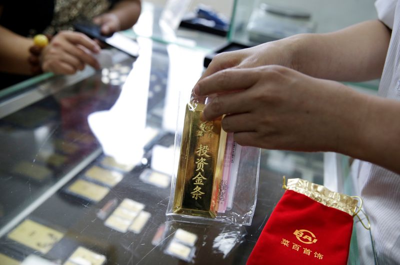 China banks, regulators move to cool gold rush