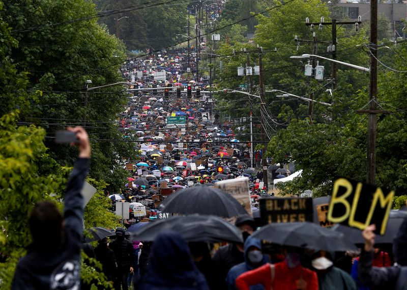 &copy; Reuters. FILE PHOTO: A silent protest march organized by Black Lives Matter Seattle-King County in Seattle