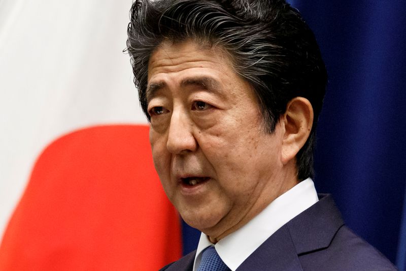 &copy; Reuters. FILE PHOTO: Japanese PM Abe gives news conference in Tokyo