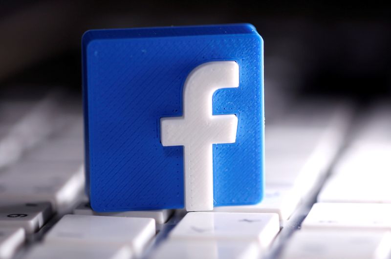 &copy; Reuters. FILE PHOTO: A 3D-printed Facebook logo is seen placed on a keyboard in this illustration