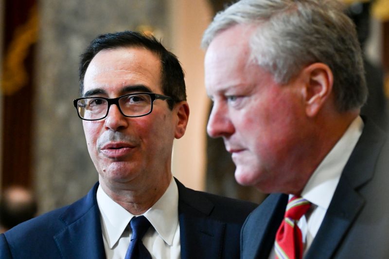 &copy; Reuters. U.S. Treasury Secretary Mnuchin, joined by White House Chief of Staff Meadows, speaks to reporters in the U.S. Capitol in Washington
