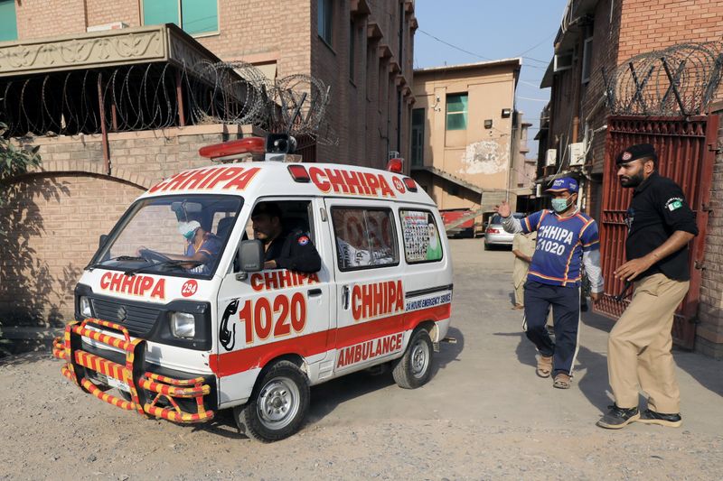 &copy; Reuters. An ambulance moves out of the Khyber Medical College (KMC) morgue, in Peshawar