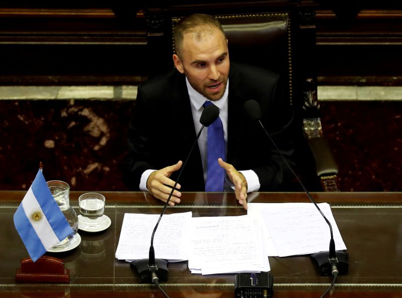 &copy; Reuters. FILE PHOTO: FILE PHOTO: Argentina&apos;s economy minister, Martin Guzman, speaks at Congress on the country&apos;s economic situation and debt plan ahead of the meetings with the International Monetary Fund officials who are traveling to the country, in B