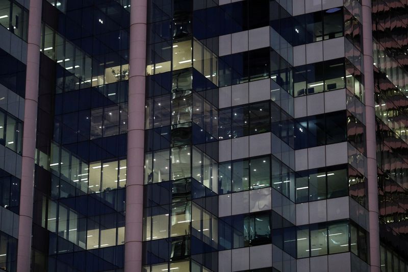 © Reuters. FILE PHOTO: Office building windows are seen in Sydney
