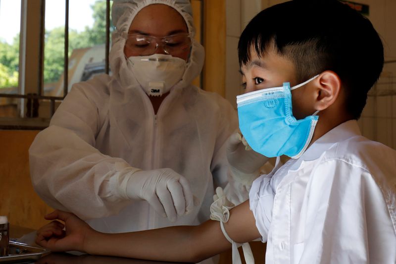 &copy; Reuters. Rapid testing center for coronavirus disease (COVID-19) outside Hanoi