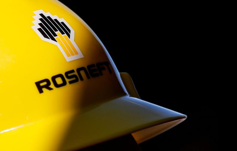 &copy; Reuters. FILE PHOTO: A view shows a helmet with the logo of Rosneft company in Vung Tau