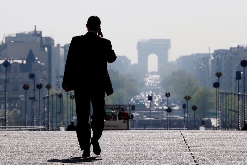 &copy; Reuters. A businessman walks on the esplanade of La Defense, in the financial and business district west of Paris