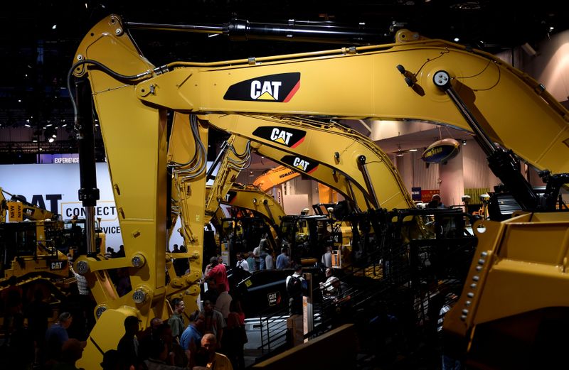 &copy; Reuters. FILE PHOTO: A row of excavators are seen at the Caterpillar booth at the CONEXPO-CON/AGG convention at the Las Vegas Convention Center in Las Vegas