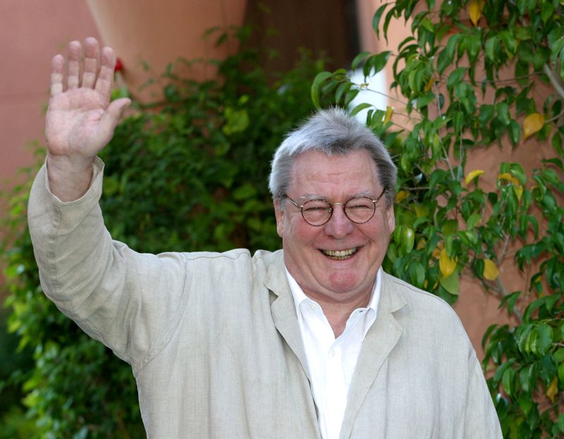 © Reuters. FILE PHOTO: British Director and Film Producer, and  President of the Jury Sir Alan Parker smiles