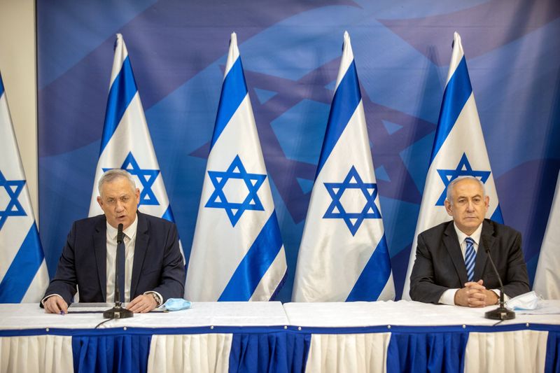 &copy; Reuters. Israeli PM Netanyahu and Alternate PM and Defence Minister Gantz issue statement in Tel Aviv