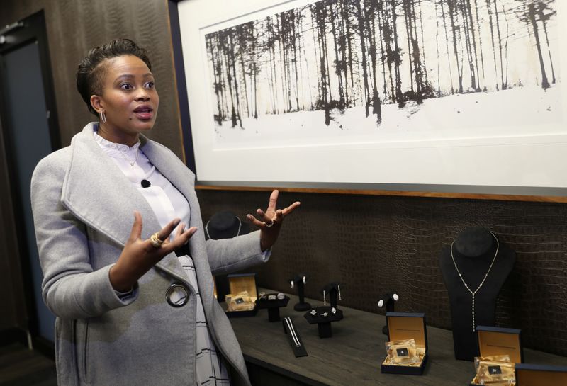 © Reuters. Ursula Pule, Creative Director for Nungu Diamonds, gestures during an interview with Reuters