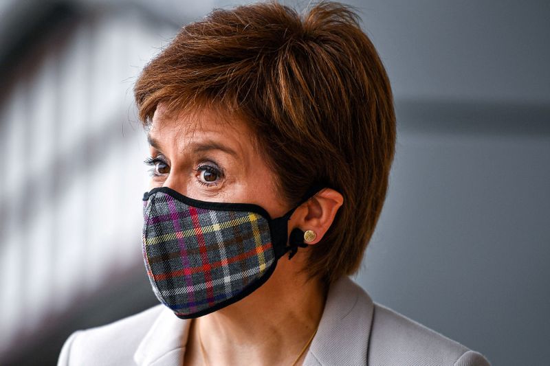 &copy; Reuters. FILE PHOTO: Sturgeon visits New Look ahead of lockdown reopening in Edinburgh