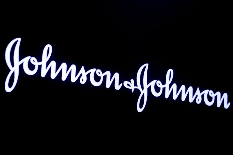© Reuters. FILE PHOTO: The company logo for Johnson & Johnson is displayed on a screen to celebrate the 75th anniversary of the company's listing at the NYSE in New York