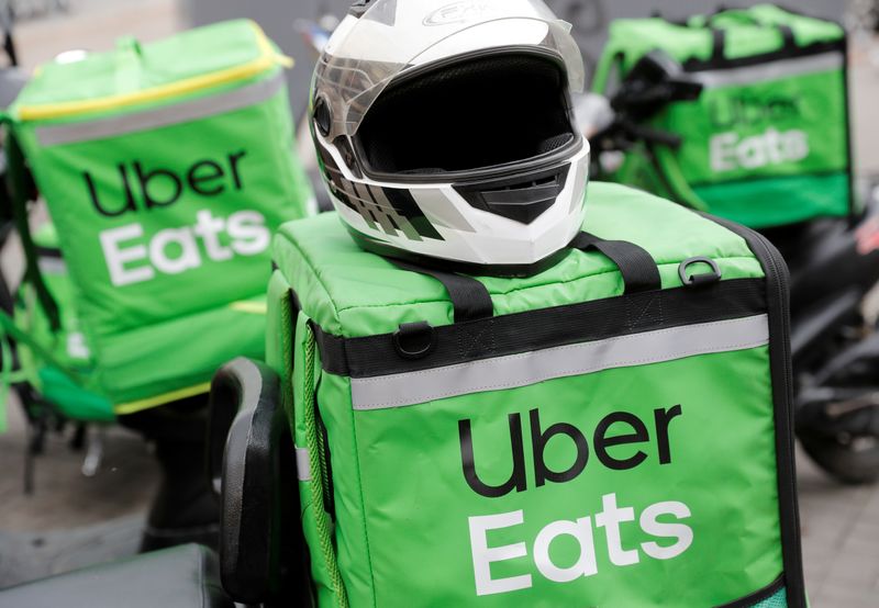 &copy; Reuters. FILE PHOTO: Delivery bags with logos of Uber Eats are seen on a street in central Kiev