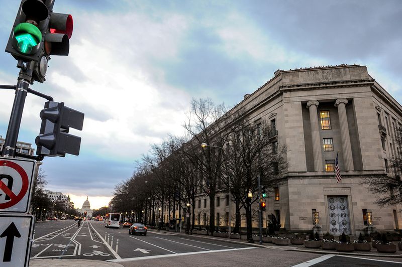 &copy; Reuters. FILE PHOTO: The U.S. Department of Justice building is bathed in morning light at sunrise in Washington