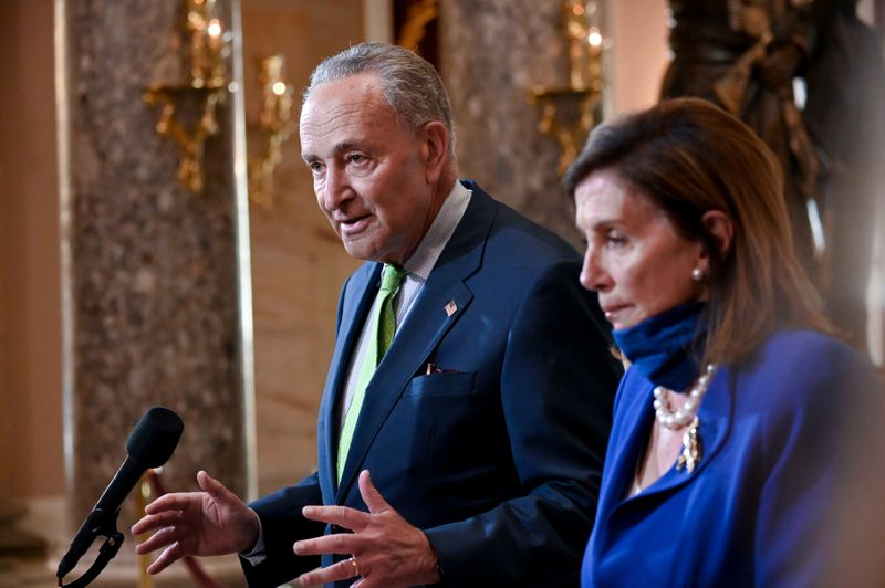 &copy; Reuters. U.S. Senate Minority Leader Schumer, joined by Speaker of the House Pelosi, speaks to reporters in the U.S. Capitol in Washington