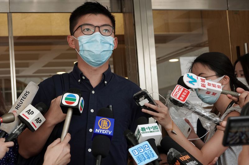 &copy; Reuters. Pro-democracy activist Joshua Wong speaks to the media at the High Court in Hong Kong