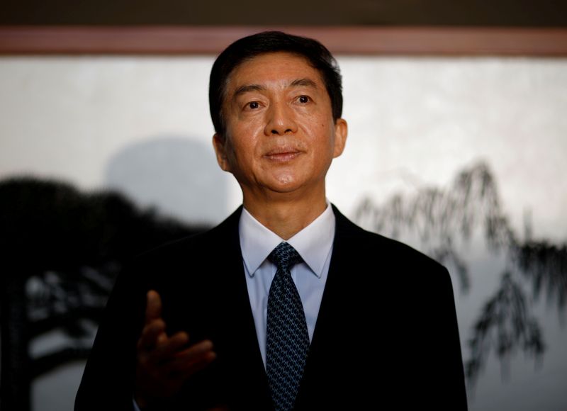 © Reuters. FILE PHOTO: Newly appointed head of Hong Kong Liaison Office Luo Huining speaks to media to mark his first day at office in Hong Kong