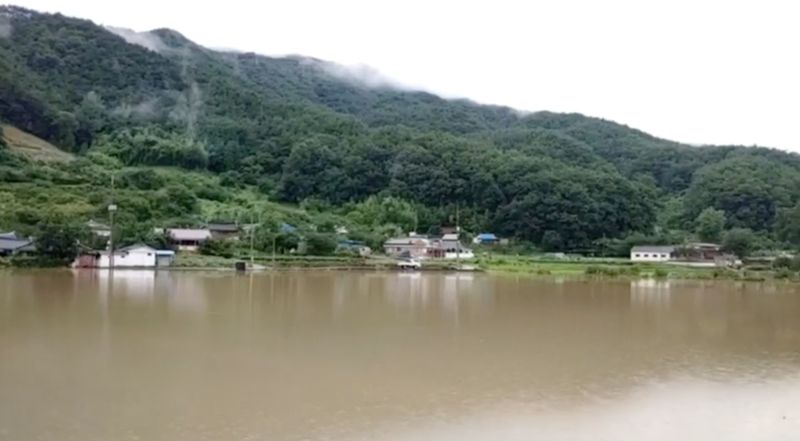 &copy; Reuters. Flooding along Seomjin River amid monsoon rains in Duga-ri