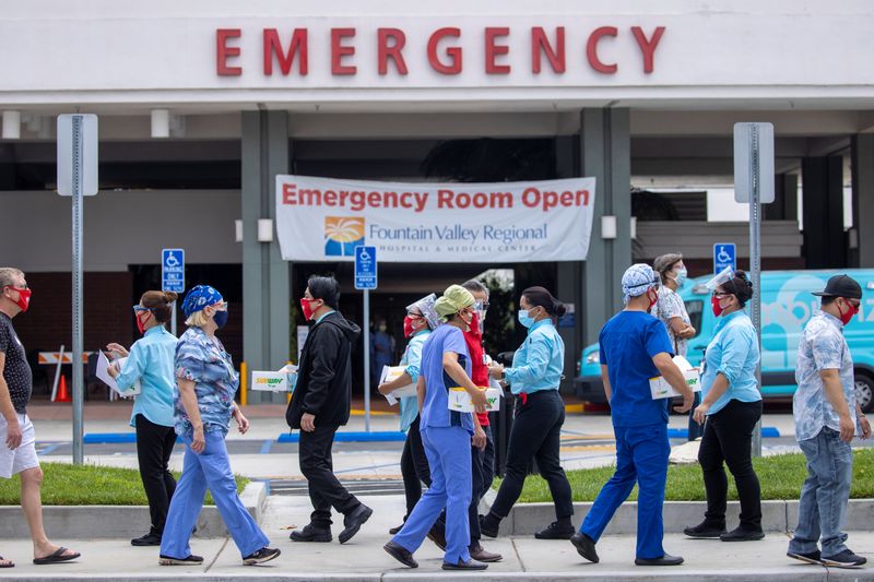 &copy; Reuters. Healthcare workers protest outside their hospital during the outbreak of the coronavirus disease (COVID-19) in Fountain Valley, California