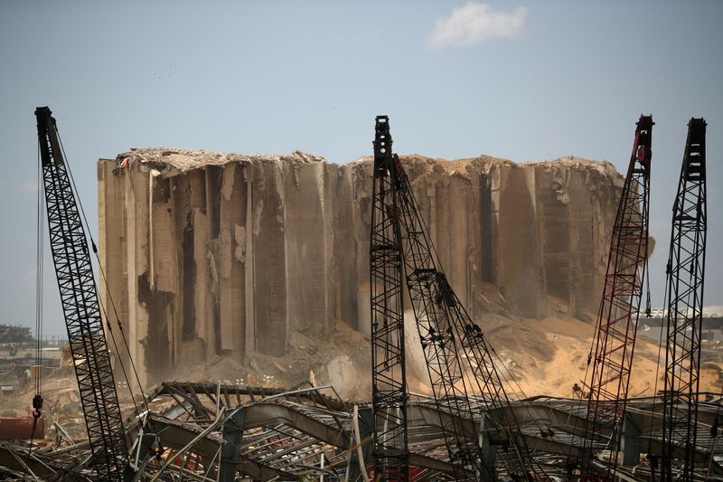 © Reuters. Debris are seen in the port area after a blast in Beirut