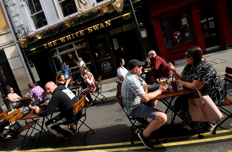 UK consumer spending recovers in July as pubs and restaurants reopen