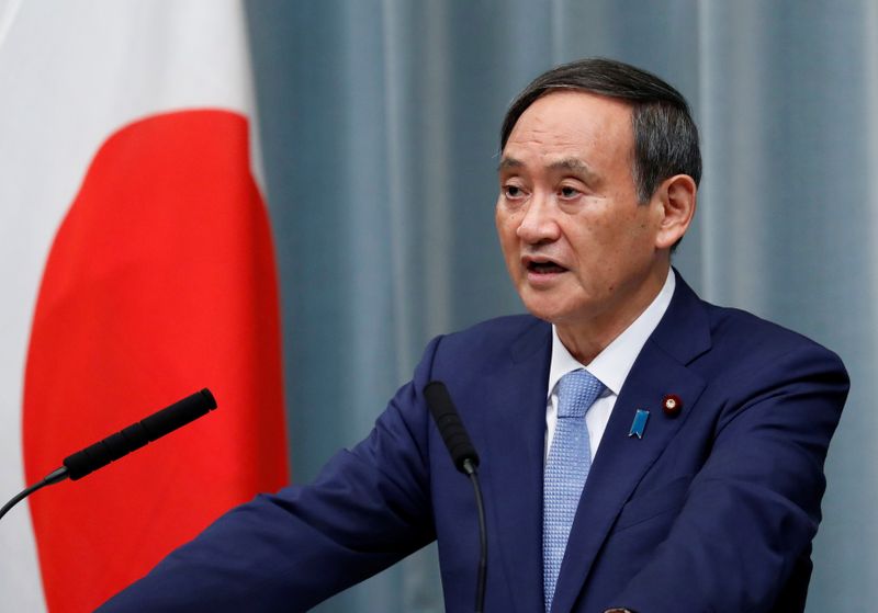 &copy; Reuters. Japan&apos;s Chief Cabinet Secretary Suga speaks at a news conference after the reshuffling of the Japanese cabinet at PM Abe&apos;s official residence in Tokyo