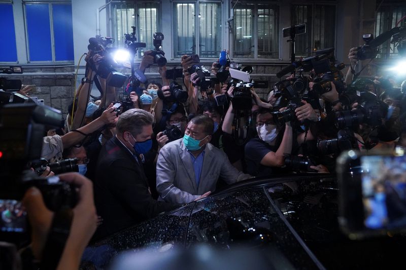 © Reuters. HONG KONG: JIMMY LAI EN LIBERTÉ CONDITIONNELLE, SON JOURNAL APPELLE À POURSUIVRE LA LUTTE