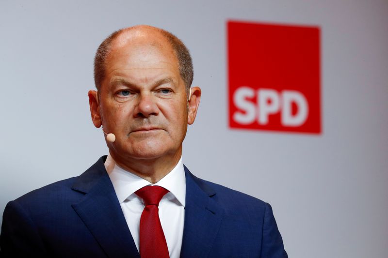 &copy; Reuters. FILE PHOTO: Olaf Scholz, who says he has been proposed by his Social Democratic Party (SPD) leadership as their candidate for the Chancellor at next year&apos;s elections, attends a news conference in Berlin