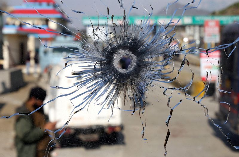 &copy; Reuters. FILE PHOTO: A bullet hole is seen in the windscreen of a truck which was used by suspected militants, at the site of a gun battle at Nagrota, on the outskirts of Jammu