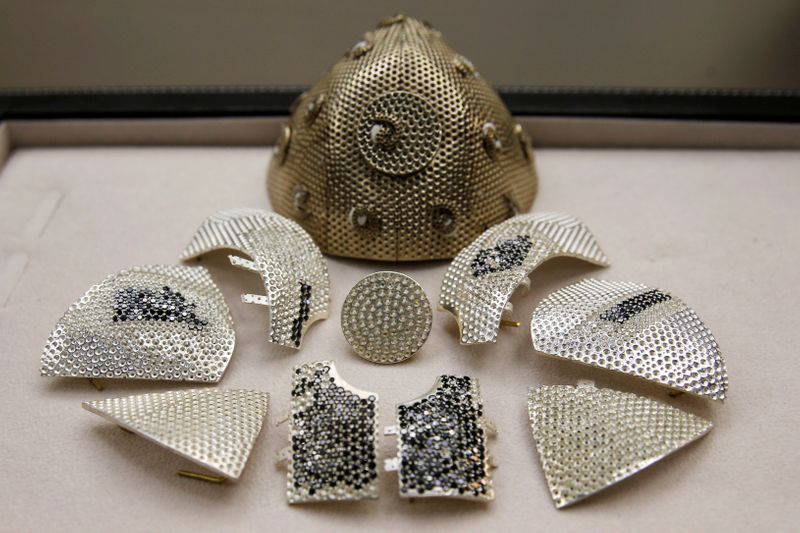 &copy; Reuters. Custom-made, diamond encrusted gold coronavirus mask, being made in Israel