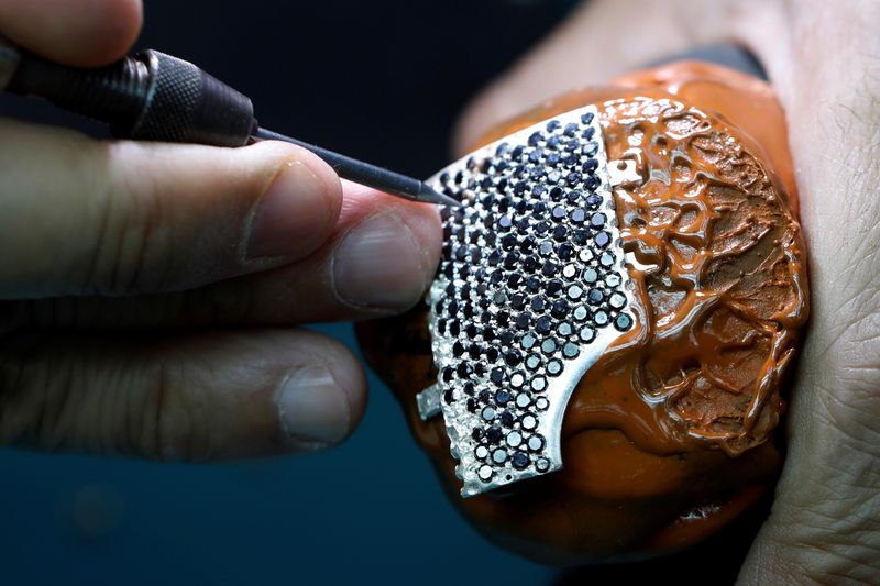 &copy; Reuters. Custom-made, diamond encrusted gold coronavirus mask, being made in Israel