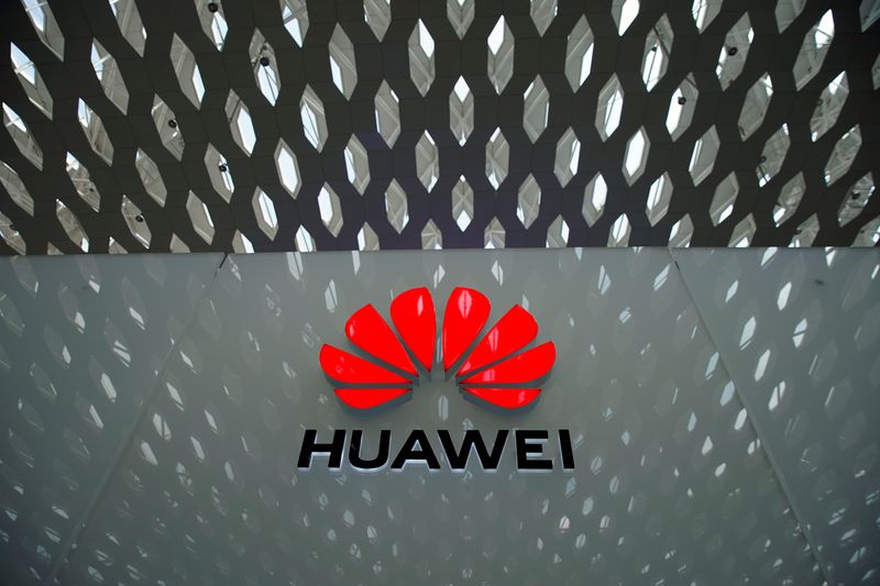 &copy; Reuters. FILE PHOTO: A Huawei company logo is seen at the Shenzhen International Airport in Shenzhen