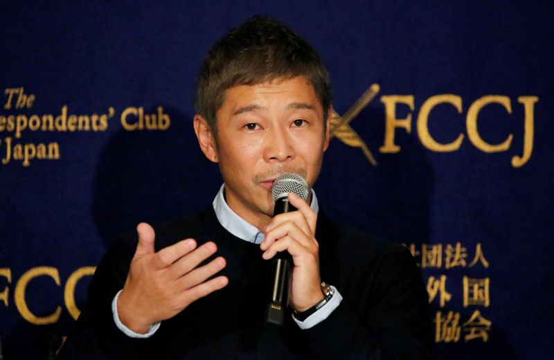 © Reuters. FILE PHOTO: Japanese billionaire Maezawa, founder and chief executive of online fashion retailer Zozo, who has been chosen as the first private passenger by SpaceX, attends a news conference in Tokyo