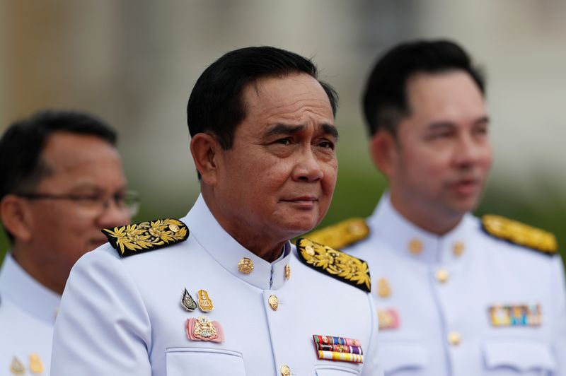 &copy; Reuters. Thailand&apos;s Prime Minister Prayuth Chan-ocha attends a family photo session with new cabinet ministers at the Government House in Bangkok