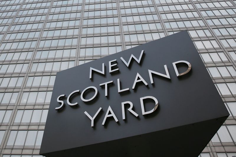 &copy; Reuters. FILE PHOTO: The rotating triangular sign is seen outside New Scotland Yard in central London