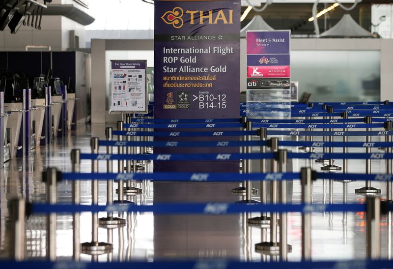 &copy; Reuters. FILE PHOTO: Empty lines are seen at Thai Airways counters in Suvarnabhumi Airport in Bangkok
