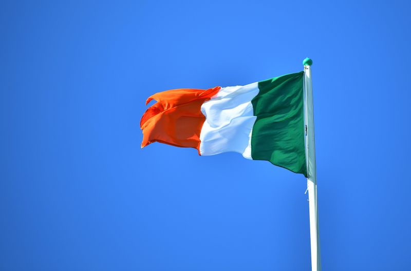 &copy; Reuters. National flag of Ireland flies above the President&apos;s residence, ahead of the arrival of Pope Francis, in Dublin