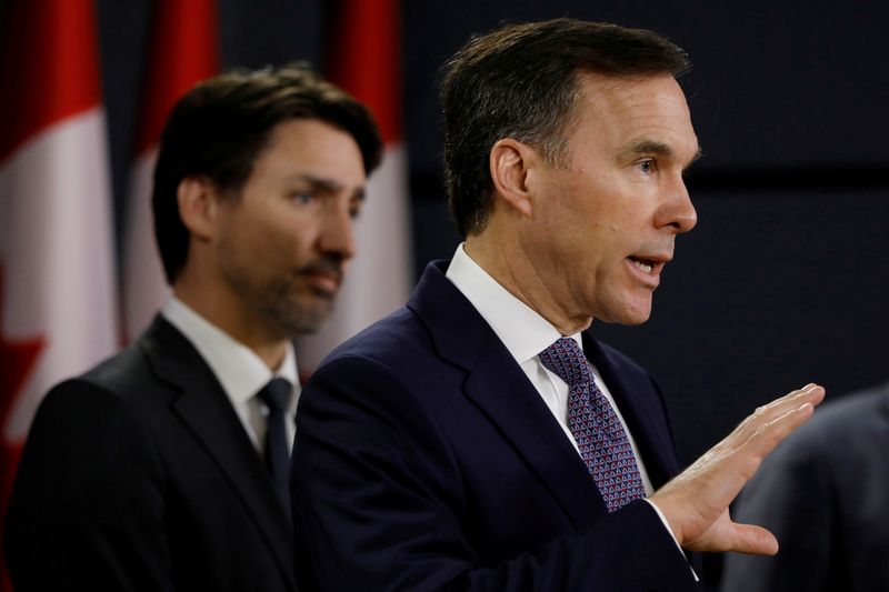 &copy; Reuters. FILE PHOTO: Canada&apos;s Minister of Finance Bill Morneau attends a news conference with Prime Minister Justin Trudeau in Ottawa