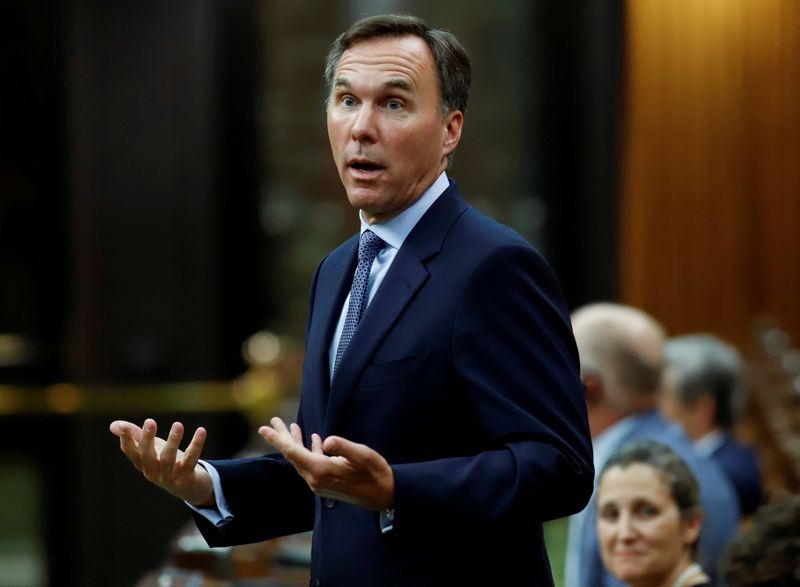 © Reuters. FILE PHOTO: Canada's Minister of Finance Bill Morneau answers a question about the Economic and Fiscal Snapshot in Ottawa